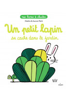 Un petit lapin se cache dans le jardin