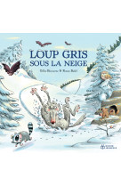 Loup gris sous la neige